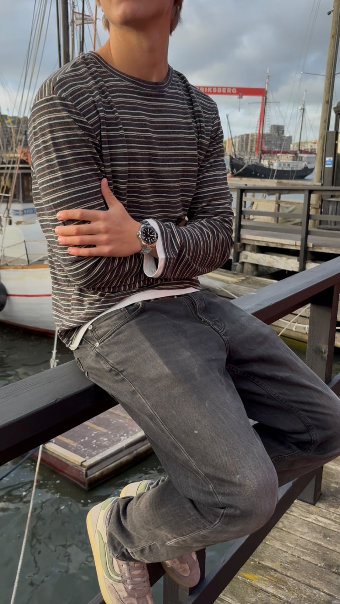 Model wearing the striped two-piece long sleeve t-shirt